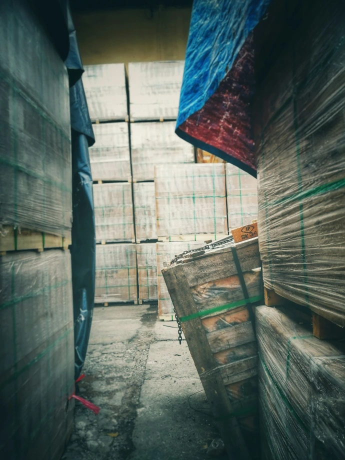 blue and red textile on brown wooden crate